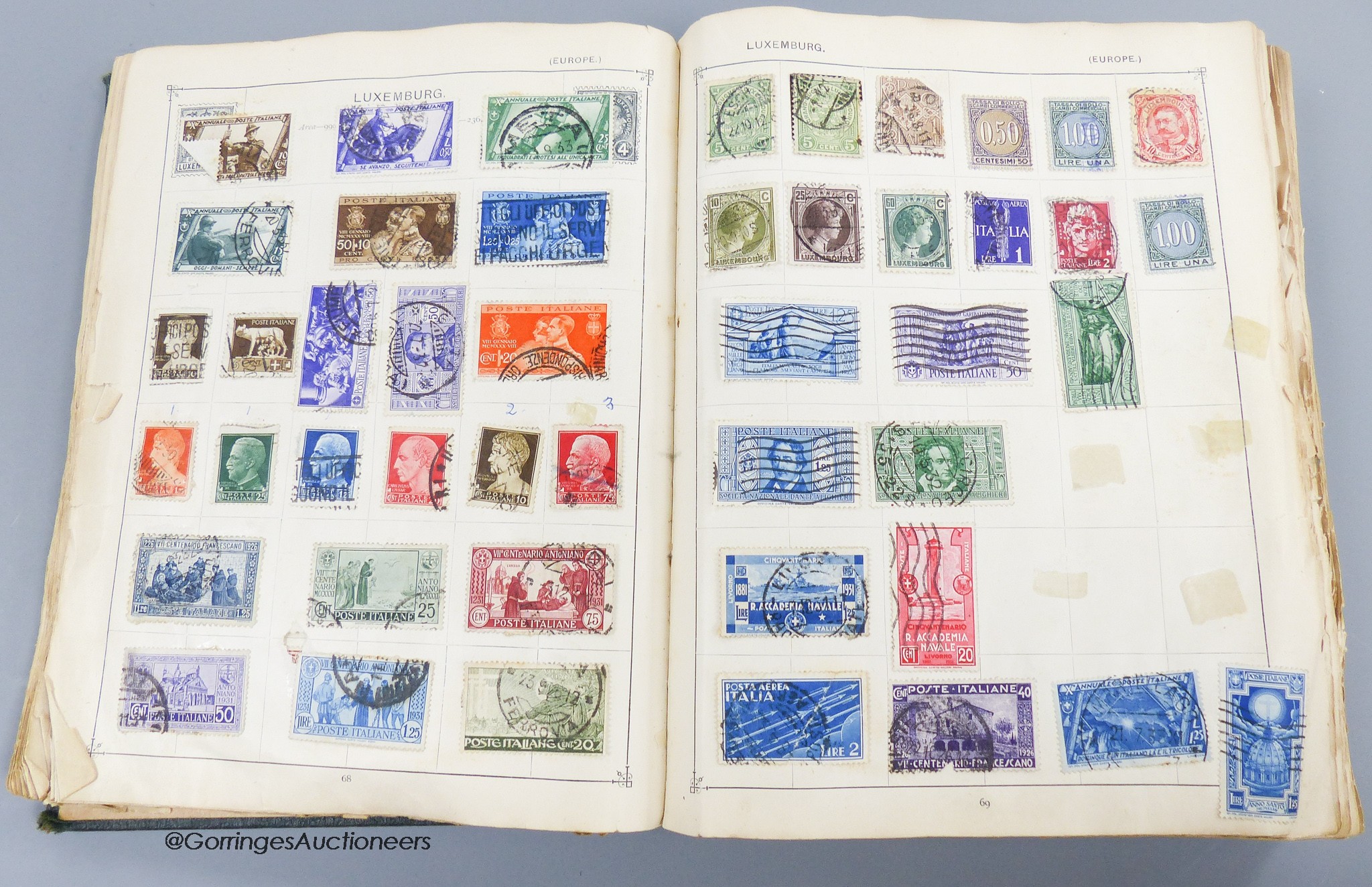 A suitcase of mostly early world stamps in albums packets with a 1937 coronation, 1945 victory album leaves, loose packets, some postal covers (affected by damp)